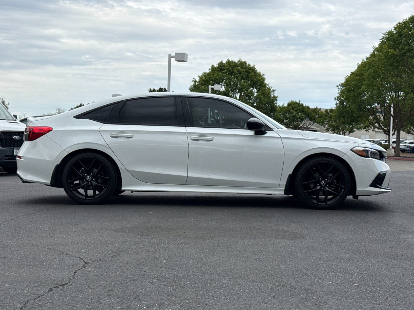 2023 Honda Civic Sport — foto completa 7 de 27